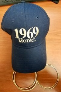 Navy blue ball cap with text: 1969 model