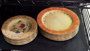 Colorful plates displayed at Ohio Valley Goodwill store