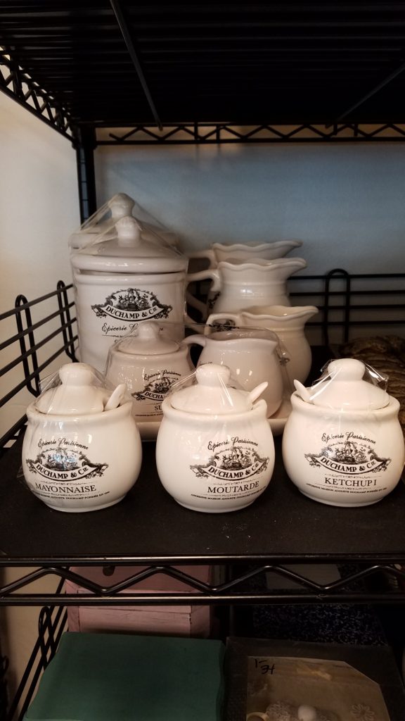 porcelain serving ware on shelf