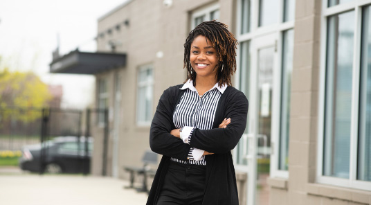 Woman stand in front of business