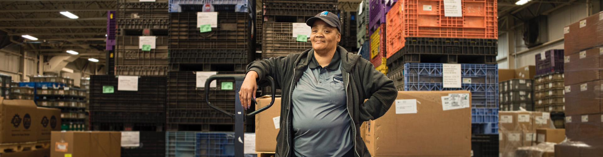 Woman standing in warehouse environment