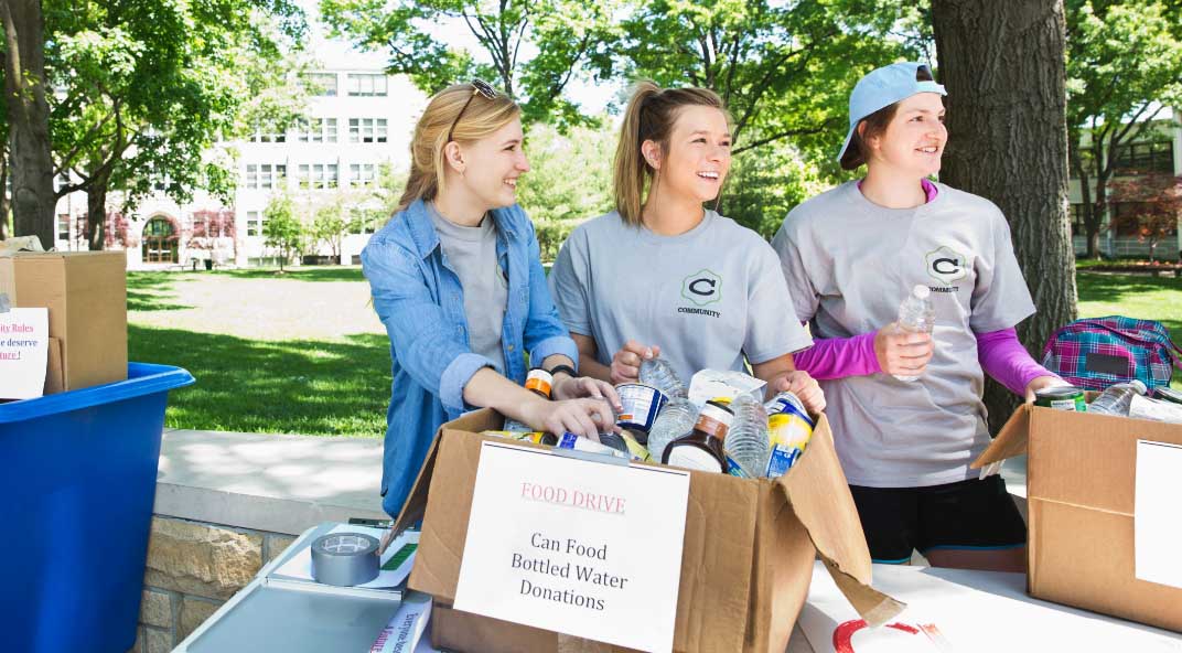 Workers at a food drive