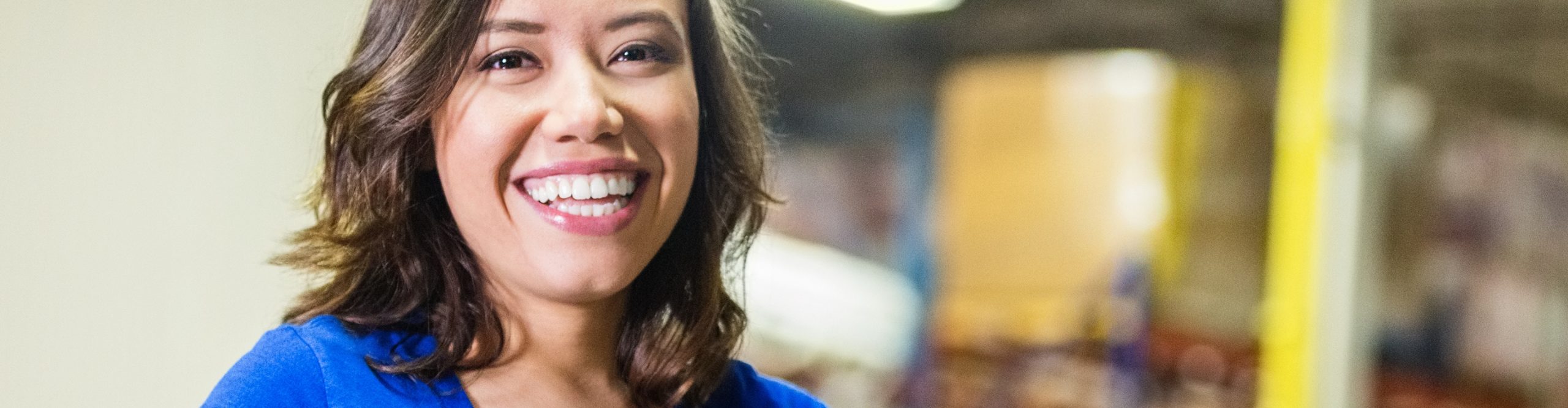 Woman smiles to camera