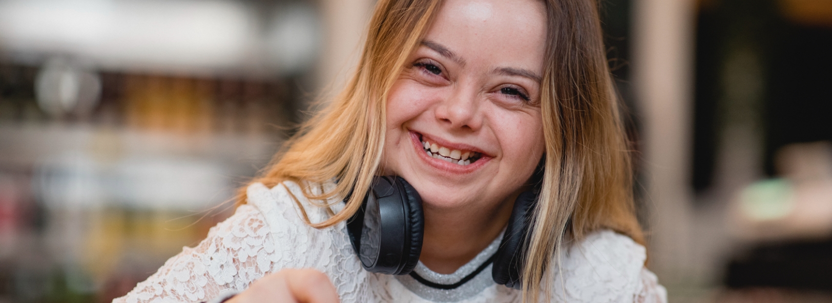 Girl smiles with headphones