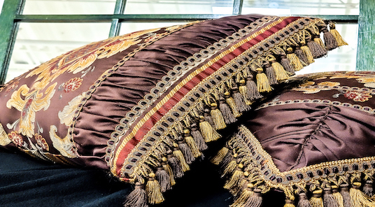 Brown pillows with tassels from Ohio Valley Goodwill