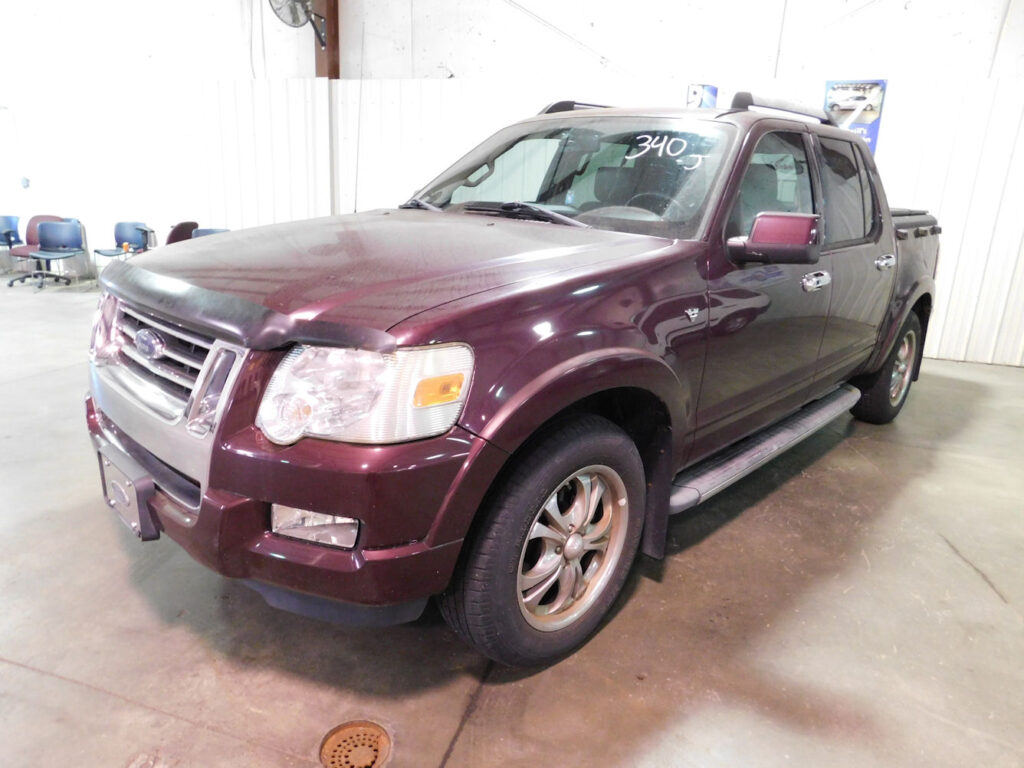 Maroon truck from Cincinnati Goodwill Auto Auction