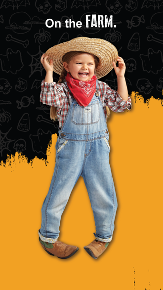 Small girl dressed as farmer in Goodwill clothes