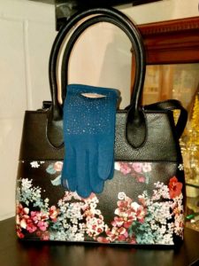Floral black bag with gloves from Goodwill