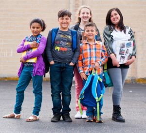 Group of students in Goodwill fashions