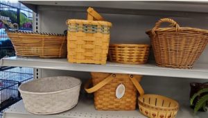 Shelf with wicker baskets at Goodwill store