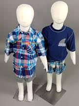 2 Child mannequins dressed in boys' outfits
