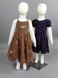 2 Child mannequins in dresses from Goodwill