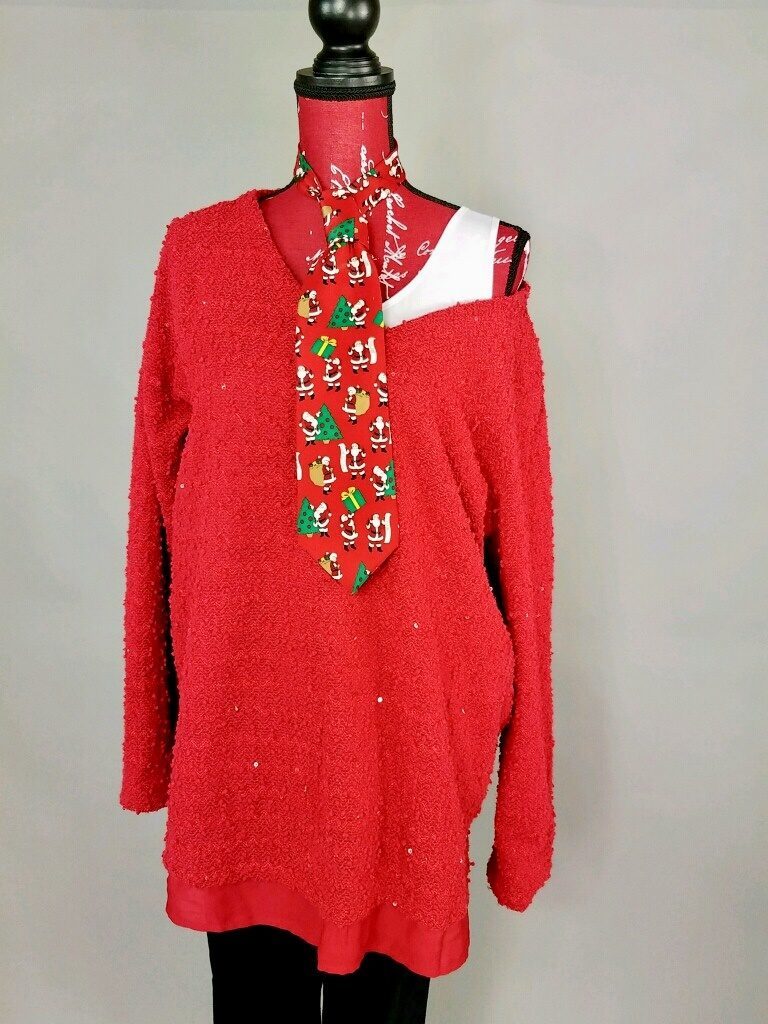 Mannequin dressed in Red sweater with Christmas tie