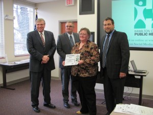 (L to R) Jim Brett, Ham. Co. Public Health, Timothy Ingram, Ham. Co. Public Health Commissioner, Alison McElfresh, Goodwill Chef, Greg Kesterman, Assistant Health Commissioner.