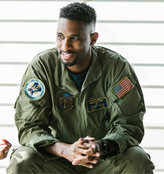 Smiling pilot in U.S. military flight suit