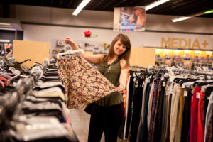 Young lady shopping at Goodwill store