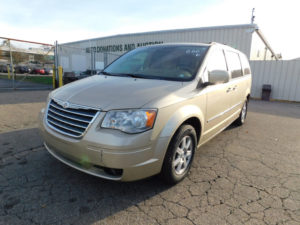 Tan Mini Van at Ohio Valley Goodwill Auto Auction