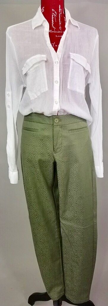 Mannequin dressed in White blouse with olive green pants