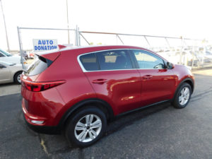 Red Kia Sportage at Ohio Valley Goodwill Auto Auction