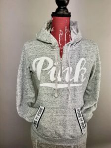 Mannequin dressed in gray hoodie from Goodwill