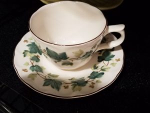 Green and white Teacup and saucer from Goodwill