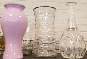 Pink and clear vases on display at Ohio Valley Goodwill store